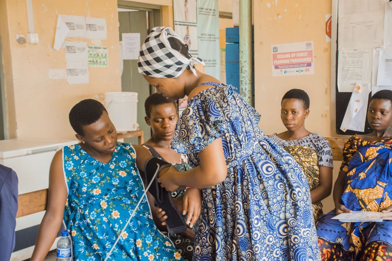 Pregnant woman using mobile health app